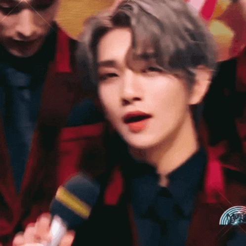 Person Speaking Into Microphone GIF