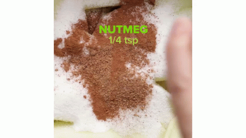 Person Spreading Nutmeg 1/4 Tsp on Cake