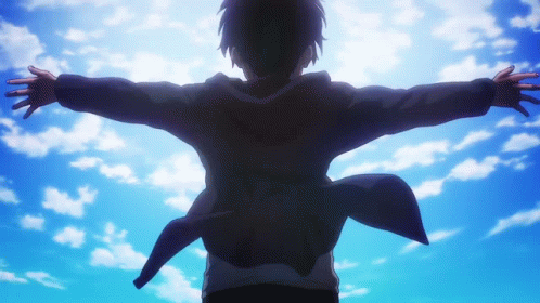 Person Standing Arms Outstretched Blue Sky GIF
