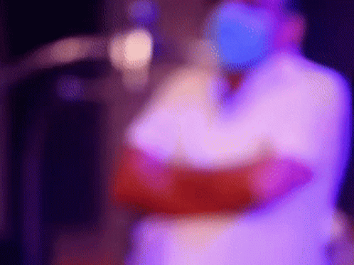 Person Standing At Microphone GIF