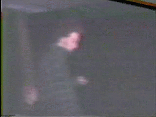 Person Standing In Dark Room GIF