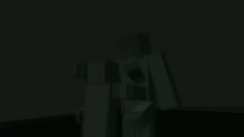 Person Standing in Dark Room