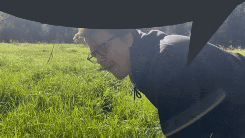 Person Standing in Field With Speech Bubble