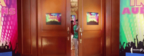 Person Standing In Front Of India Door GIF