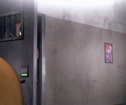 Person Standing In Prison Cell With Picture GIF