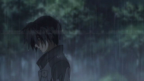 Person Standing In Rain With O Sleeve GIF