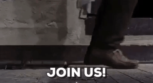 Person Standing on Sidewalk Saying Join Us