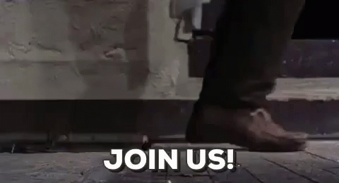 Person Standing on Sidewalk Saying Join Us