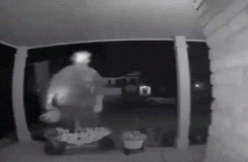 Person Standing Porch at Night
