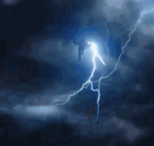 Person Struck By Lightning In Dark Sky GIF