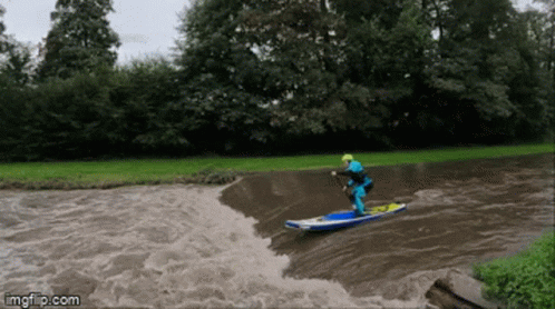 Person Surfing in River