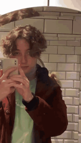 Person Taking Selfie in Mirror