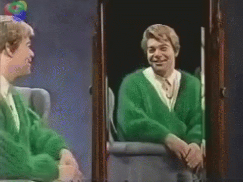 Person Talking To His Self In Mirror GIF