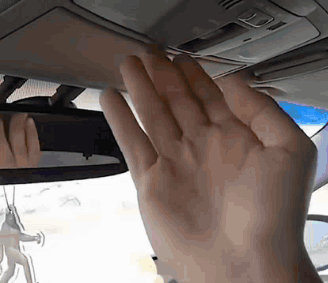 Person Touching Car Ceiling