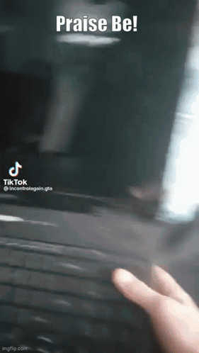 Person Touching Praise Be Screen
