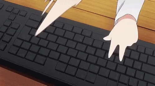 Person Typing on Black Keyboard