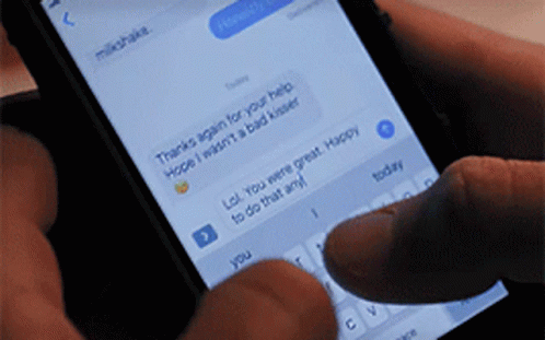 Person Typing on Cell Phone With Mikshake Message