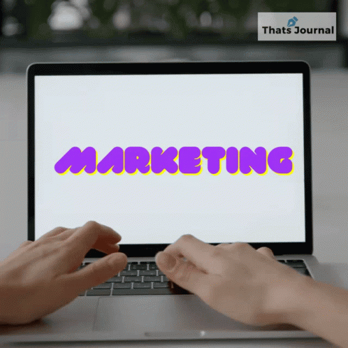Person Typing on Laptop Saying Marketing