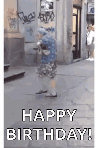 Person Walking Down Street With Happy Birthday GIF