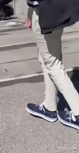 Person Walking In Blue Sneakers GIF