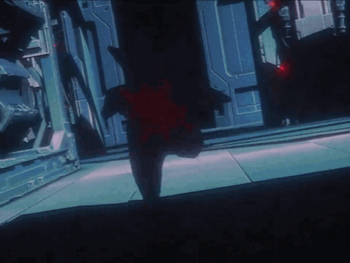 Person Walking In Dark Room With Red Star GIF
