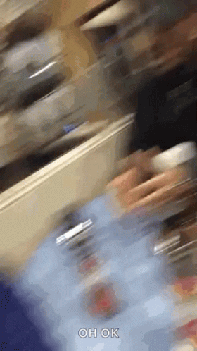 Person Walking In Room With Oh Ok GIF
