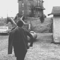 Person Walking Towards House