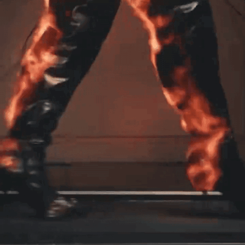 Person Walking Treadmill with Flames