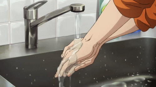 Person Washing Hands With Soap