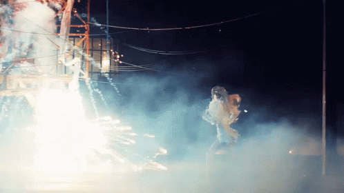 Person Watching Fireworks Display GIF