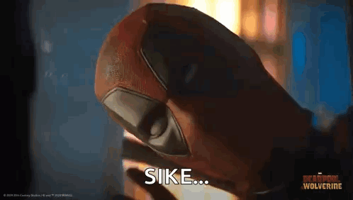 Person Wearing Deadpool Glove with Sike