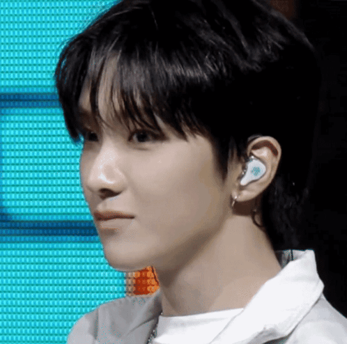 Person Wearing Earbuds