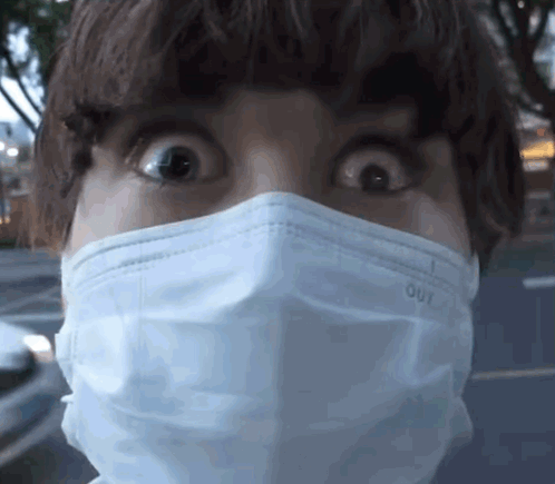 Person Wearing Face Mask Saying Out GIF