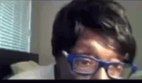 Person Wearing Glasses and Headphones