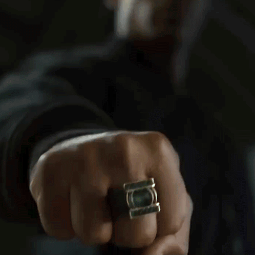 Person Wearing Glowing Green Ring GIF