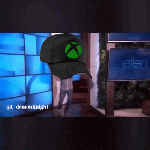 Person Wearing Green Xbox Hat Walking