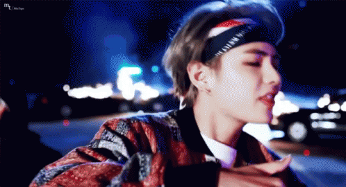 Person Wearing Headband And Jacket GIF
