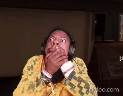 Person Wearing Headphones Covering Mouth GIF