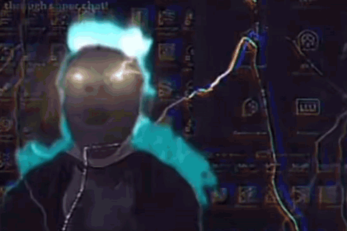 Person Wearing Headphones in Front of Lightning Screen