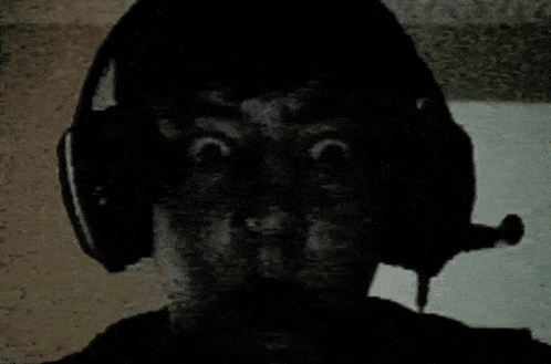 Person Wearing Headphones With Microphone GIF
