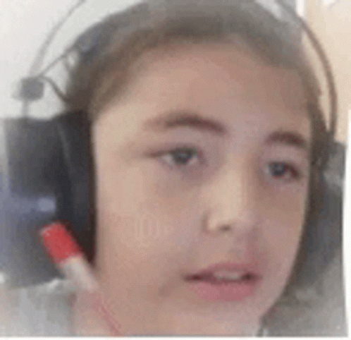 Person Wearing Headphones With Red Marker