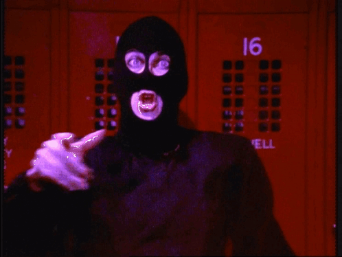 Person Wearing Mask at Lockers Number 16