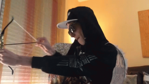 Person Wearing Moschino Hoodie GIF