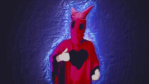 Person Wearing Red Horned Mask