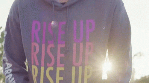 Person Wearing Rise Up Rise Up Hoodie GIF