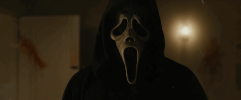 Person Wearing Screaming Mask