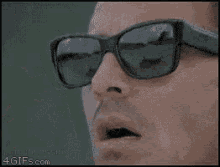 Person Wearing Sunglasses GIF