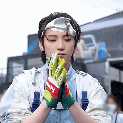 Person Wearing Supreme Headband and Gloves