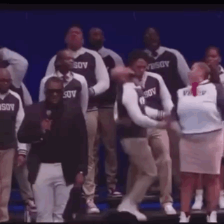 Person Wearing USOV Shirt on Stage