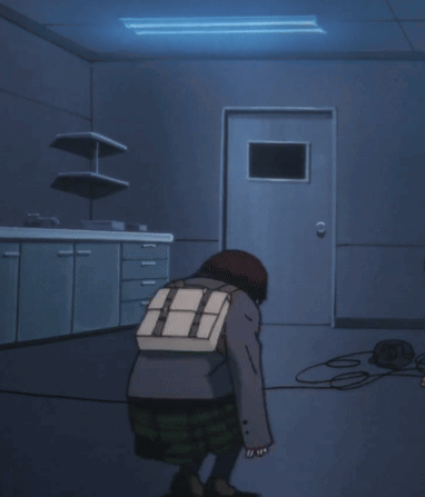 Person With Backpack Walking in Dark Room